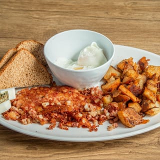 2 Eggs Your Way w/Home Fries or Beans & Choice of Toast or Biscuit