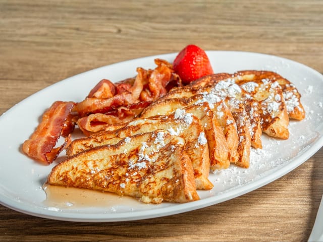 French Toast Stack (2) w/Butter, Powered Sugar & Syrup.